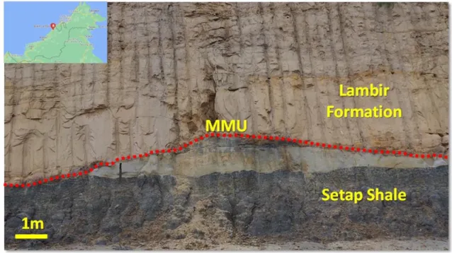 Figure 8b:  View of the Mid-Miocene Unconformity (MMU, red dashed line), road cut in  Bukit Lambir, NW Sarawak