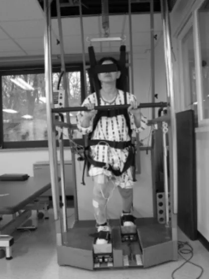 Figure 1. picture of one GT-FES subject undergoing gait  training on the gait trainer