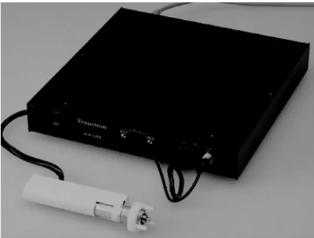 Fig.  2.  The  tactile  sensor  tip  (arrow)  which  is  placed  and  moved  on  the  material  to  be  measured