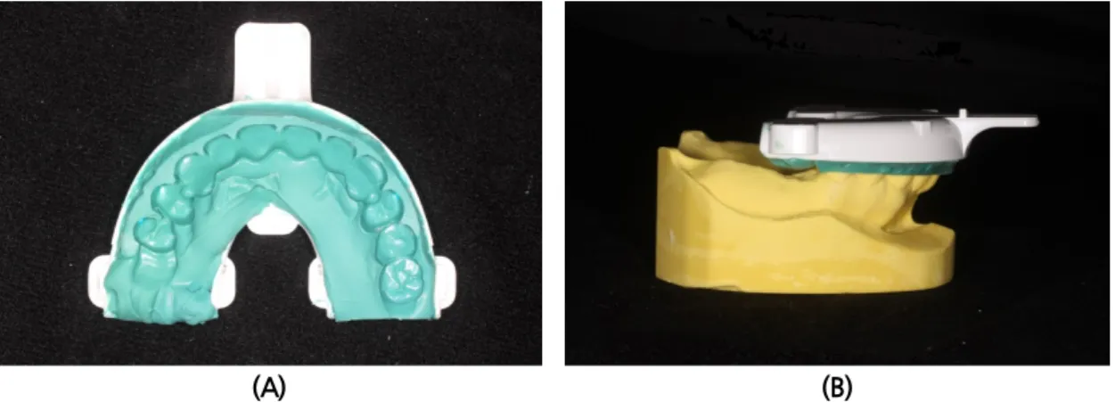 Fig. 2. (A) CBCT was taken after a radiographic guide tray filled with polyether impression material was  put on maxillary dentition