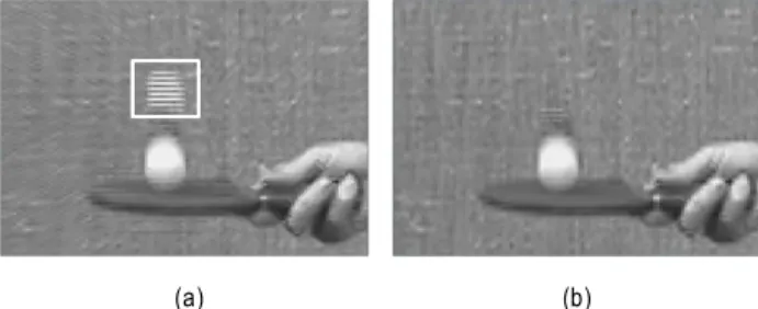 Fig.  7.  Results  of  motion  detection,  (a)  pixel-based  motion  detection,  (a)  modified  motion  detection  using  block-based  motion  detection