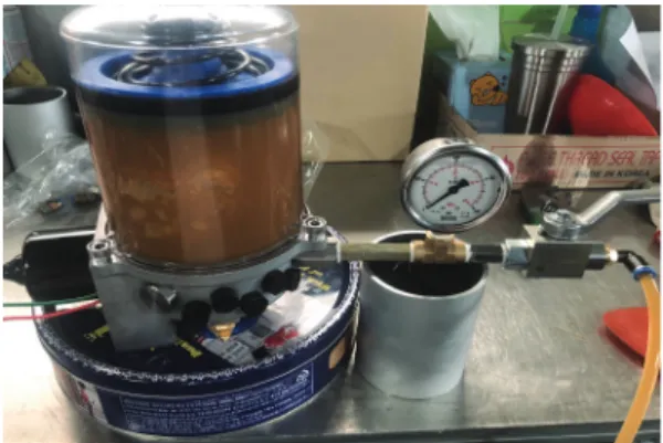 Fig.  2  Experimental  test-bed  compact  automatic  lubrication  system