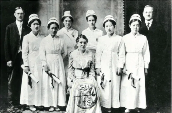 Figure 1. College graduates of nursing school in Severance hospital and from the left, a doctor Hurst, Shields, 