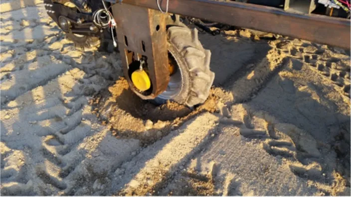 Figure 15. A picture of the HADA-Bot tire digging into ground  during causing a 2° to 4° tilt.