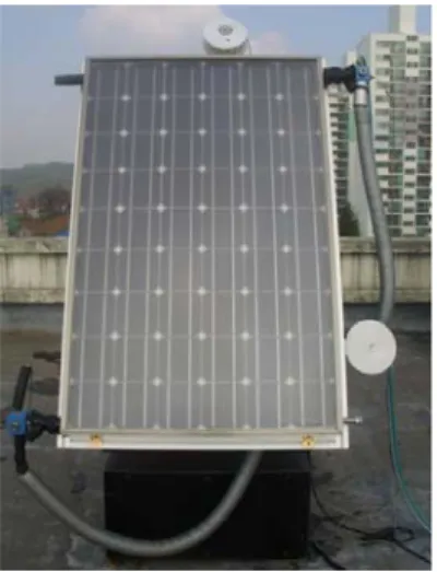 Fig.  2  PVT  combined  module  attached  on             test  Equipment 또한  온도  측정을  위한  열전대(Thermalcouple  :RTD  type)를  PV/T  시스템의  입출구  온도  및  외기온도  측정을  위해  설치하였다
