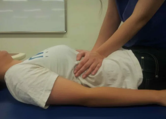 Fig.  2.  PNF  respiratory  exercise  by  supine  position
