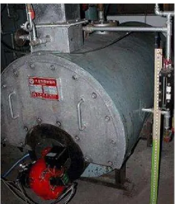 Fig. 3 Picture of a flue tube type boiler with burner. 자트로파 유를 상온 상태 (35 ℃ ) 에서 연소 가능 시험을 시작하였다 버너에 내장된 파일럿 연소 