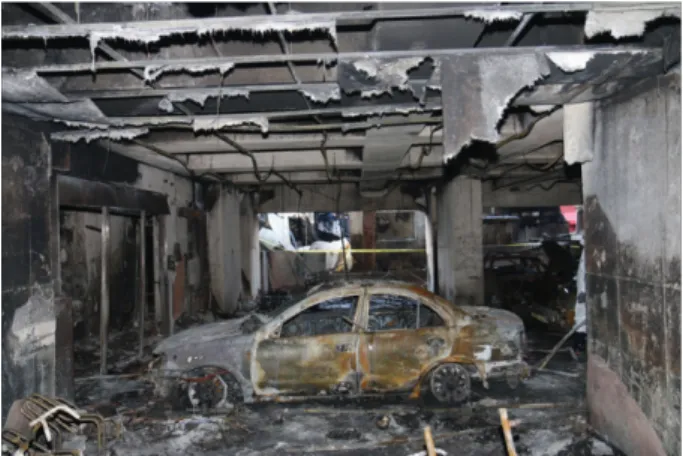 Figure 7. An open fire door. Figure 8. Feature of the broken door by fire.