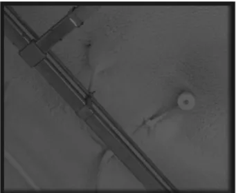 Figure 5. Urethane painting on a ceiling. Figure 7. Storage between a rack.