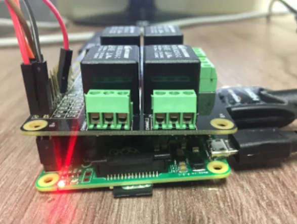 Fig. 1.  Power relay board made of laminated Raspberry Pie.