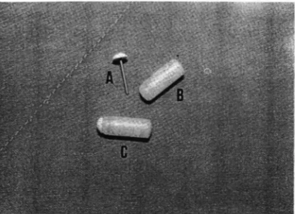 Fig.  1.  Minios motic  pump  before(A,  B)  and  after  (C)  setting  of  the  parts:  flow  moderator(A)  is   in-serted  into  the  pump(B),  which  is  filled  with  drug