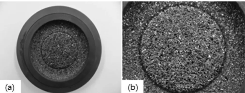 Fig. 3. A photograph of SiC crystals grown on the upper part of source materials inside of the crucible.