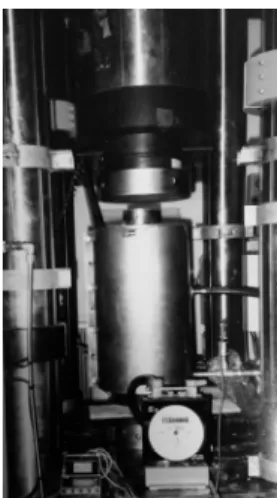 Fig. 1 Specimen’s size and schematic drawing of various accessories Photo 2 Test set-up under loading condition