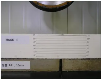 Fig. 3. Test specimen of asphalt mixture attached to the top of concrete