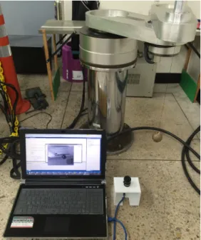 Fig. 3  A  photo of the developed two-dimensional real- real-time motion tracking detection system including  a two- DOF SCARA robot 