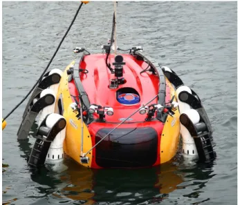 Fig. 1 Conceptual pictures of the CR200 : (a) Walking  on  the  sea  floor,  (b)  manipulation  with  robot  arms, and (c) To overcome strong tidal current 