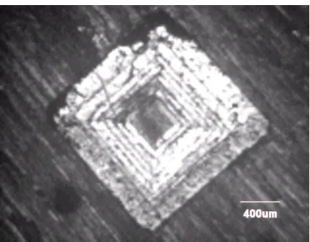 Fig. 14  Pyramid feature machined by micro machine    한편,  육각형  형상을  포함하여  텍스트와  피라미 드  형상  등의  모든  절삭  가공에는 NC 화  프로그 래밍을   적용하였다
