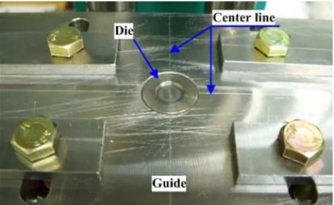 Fig.  10  Comparison  of  cross-section  of  hole  clinched  joint in experiment and FE-analysis 