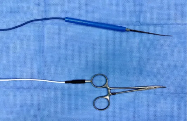 Fig. 1. Attachable magnetic nerve stimulator (below) and  conventional monopolar nerve stimulator (above).
