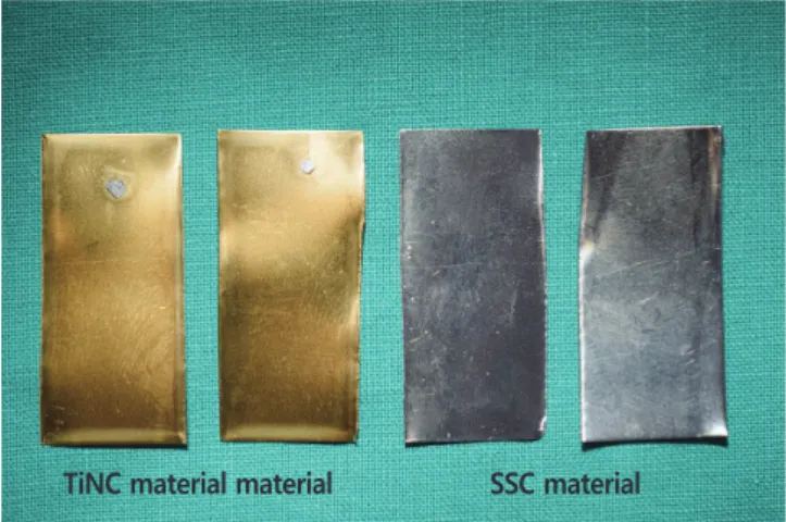 Fig. 3. Rectangular plate specimens of 2 materials for cor- cor-rosion	resistance	test	(each	sized	33.0	×	11.0	mm).