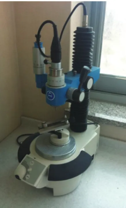 Fig. 1.  Photograpic view of the handpiece mounted  milling machine.