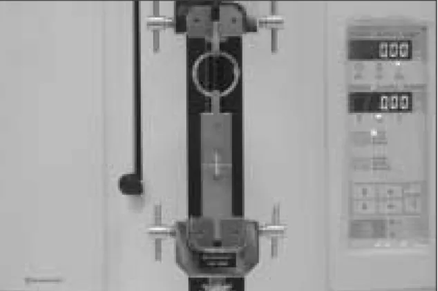 Figure 1.  Specimen adhered to the testing apparatus Figure 2.  EZ test for microtensile bond strength test