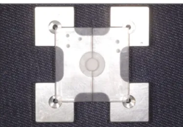 Fig. 4. Schematic diagram of shear bond strength testing. Fig. 5. Shear bond testing assembly on UTM.