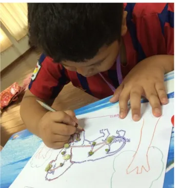 Figure 4. A working student happily paying full attention to the larning activities.