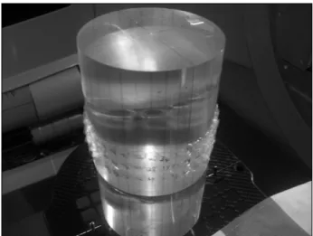 Fig.  3.  To  obtain  the  surface  dose  profile  as  a  function  of  angle  of  incidence,  a  strip  of  radiochromic  film  with  the  dimensions  of  12×35  cm,  was  wrapped  tightly  around  cylindrical  phantom.