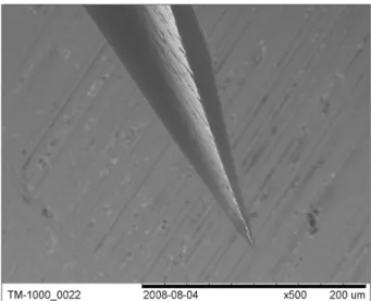 Figure 4. Bent needle tip, needle point off-center (control  group)  (X500).