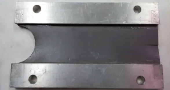 Fig.  1  Specimen  of  particulate  reinforced  composite.