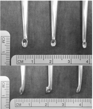 Fig. 3. Locked facet reduction. Reducing the locked facets by a spinal curette.