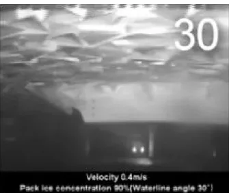 Fig. 9 Under water view of resistance test with 40mm pack  ice  (0.4m/s,  90%,  α=30°)
