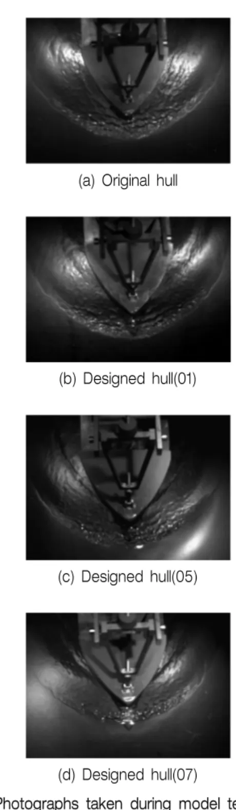 Fig. 12 Photographs taken during model tests for the  original and the selected design hull forms at  Fn=0.2
