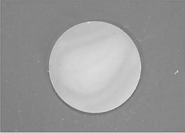 Fig. 1. Mix thoroughly in a pestle and mortar. Fig. 2. Transparent pellet.