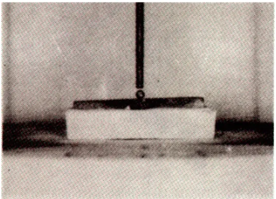 Fig.  5.  Soldering  block  placed  under  the  alignment rod in its soldering position.