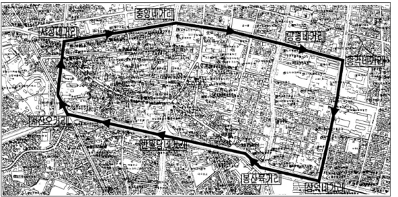 FIGURE  1.  Travel  route  and  direction  of  testing  vehicle 한  악조건에서의  GPS  수신상태  점검이란  측 면에서  볼  때,  GPS  수신장애가  클  것으로  예 상되는  고층건물  밀집지구이며,  교통정책의  최 우선  반영  대상지역이기  때문이다