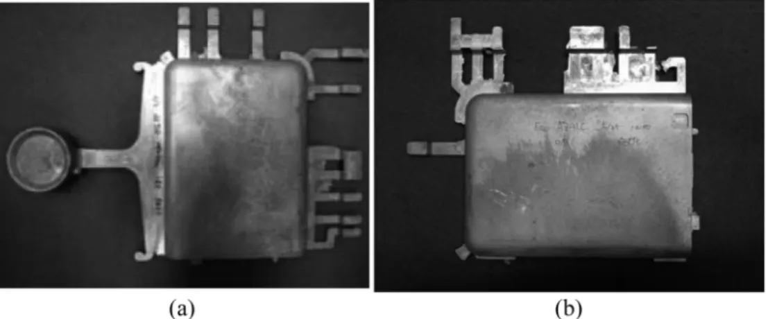 Fig. 1. Cell phone case produced by cold chamber diecasting of (a) AZ91D under SF 6 , (b) 0.7wt.% CaO added AZ91D Eco-Mg without SF 6  gas.