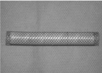 Fig. 1. The PTFE-covered self-expanding Niti-S stent endopros- endopros-thesis. The stent is a woven, monofilament structure composed of nitinol, and it is covered on its interior surface by PTFE.