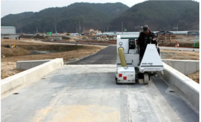 Fig. 11 Construction Procedure for Ultra-thin Bridge  Deck Pavement using Bio-Polymer Concrete