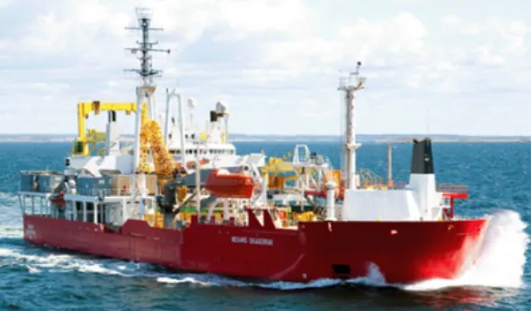 Fig. 4 Ground storage guide with installed coiling armFig. 1 Installation ship of submarine cable