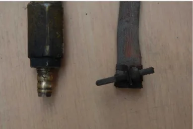 Fig. 9. Detached metal pipe and rubber hose