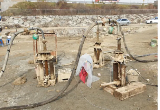 Fig. 2. Multiple Simultaneous Compaction Grouting Pump and Grout Injection