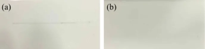Fig.  3.  Surface  hardness  measurement  of  the  sample  annealed  in  vacuum  condition,  (a)  a  pencil  line  drawn  on  the  surface,  (b)  after  erasing  the  pencil  line  trace.