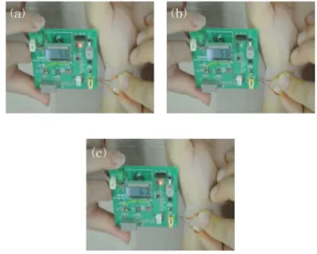 Fig.  10.  Real-time  pulse  measurement.  Heart  beat  of  (a)  56,  (b)  58,  and  (c)  63