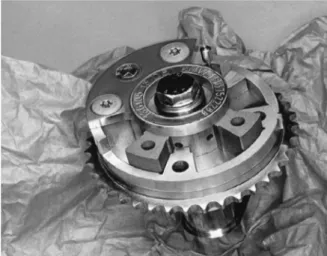Fig. 1. 과공정 Al-Si  합금분말소재의 Chain Sprocket이 내장된 BMW  社의 Camphaser System 8) .