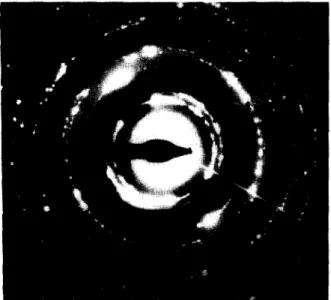 Fig.  8.  High  resolution  TEM  image  of  the  crystalline  AIZO,  layer.  Both  ;‘-AI,O;  crystallites  and  amorphous  patches  are  discernible