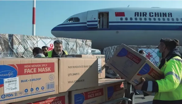 Figure 6. Airport Staff Unload Boxes of Face Masks and Medical Supplies from an Airplane of Air China, in Athens, Greece, on March 21, 2020