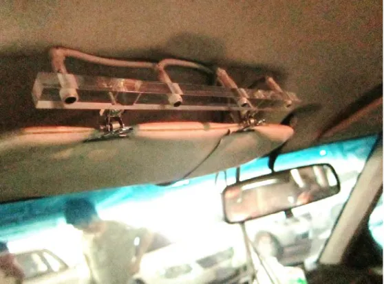 Fig. 10 The photo for the microphone array at the sun shield of the driver’s seat.