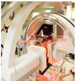 Fig. 1 :  The instrumented ergonometer integrated  with the dynamic fluoroscopy system for cycling  exercise
